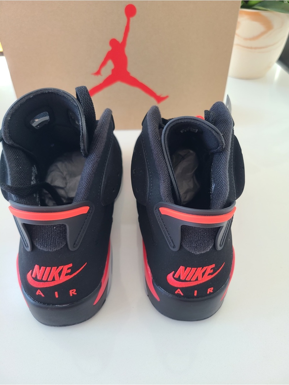 Jordan Kids Black Sneakers with Red Pull Tabs and Multicolor Tongue